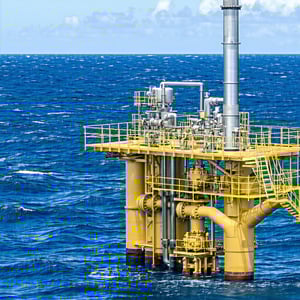 Seawater Supply - Industrial seawater lift pumps operating on an offshore structure with pipes submerged and ocean in the background-2